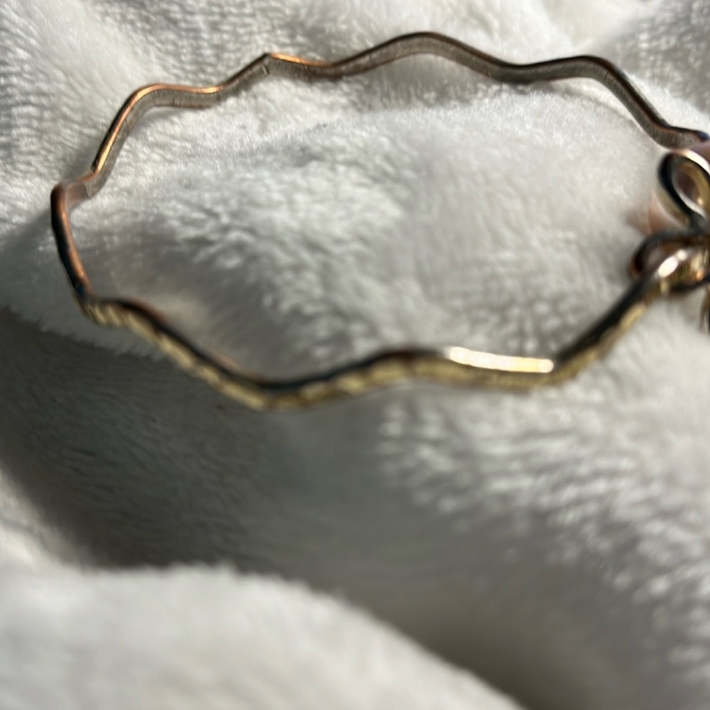 Bracelet Cone, hammered for texture, irregular shape, pearl & clover. Good luck.